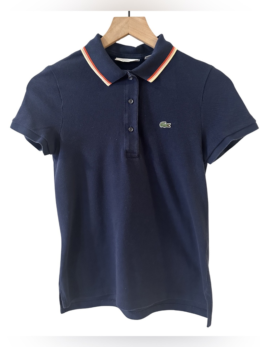 Lacoste Navy Pique Polo with Red, Yellow and Pink Trim Collar